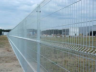 Several galvanized 3D security fences with three curves surrounding the factory.