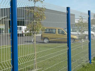 White 3D security fences are surrounding the parking lot.